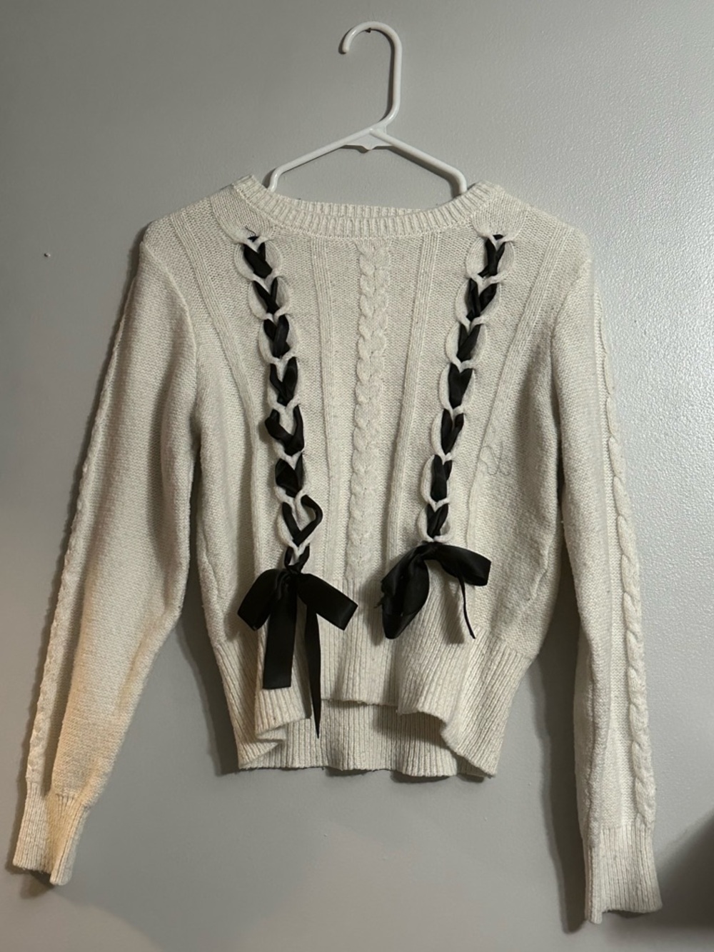 Cream Cable-Knit Crewneck Sweater with Black Ribbon Trim